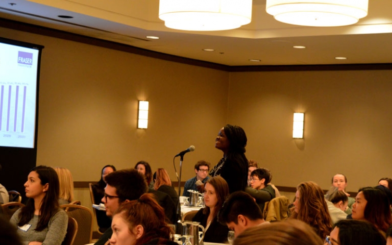 A student poses a question to the speaker following a presentation in Toronto.